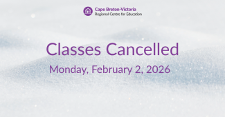 Purple text on snow-covered background reads: “Classes Cancelled. Monday, February 2, 2026”